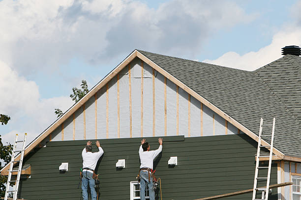 Professional Emergency Siding Repair technician working in Girard, IL